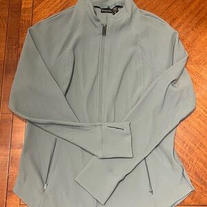 Athleta Ribbed Zip-Up Jacket in soft sage/grey-blue.
